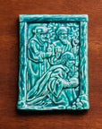 This tile features the matte turquoise Pewabic Blue glaze.