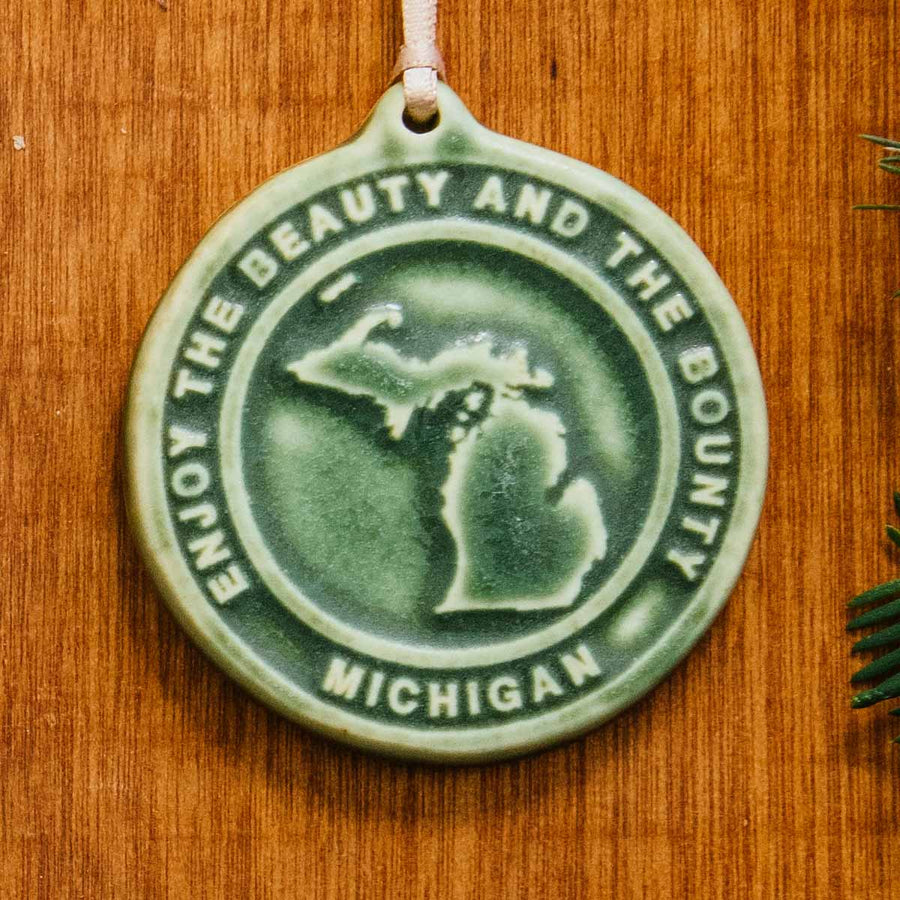 This Michigan Ornament features the matte organic green Leaf glaze.
