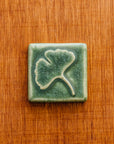 This Ginkgo Tile features the matte organic green Leaf glaze.