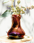 The Copper iridescent glaze is a shiny, smooth metallic glaze with many variations. Some pieces end up with a blue-gray flashing of color that covers a portion of the surface.