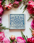 This Lotus Tile features the glossy steel blue Celestite Glaze.