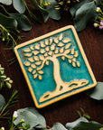 The Botanical Tree tile features a large tree motif with a line border around the tile edge.