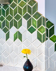Detail shot of the Rhombus tile design and Bud Vase in Copper Iridescent.