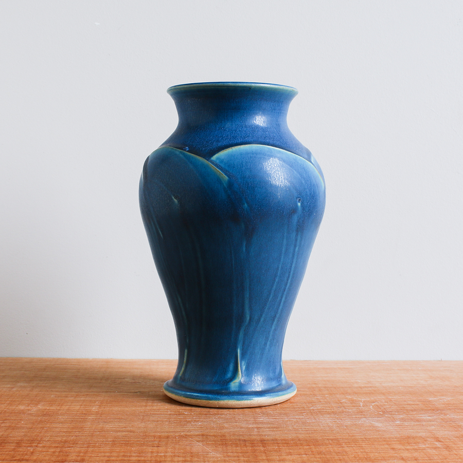 This Classic Vase features the matte french blue Peacock glaze.