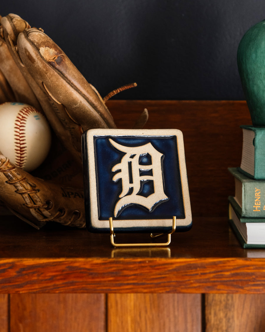 Old English "D" Tile on a handcrafted Stickley cabinet. 