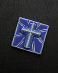 This Mario's Cross Tile features the matte bright steel blue Periwinkle Glaze.