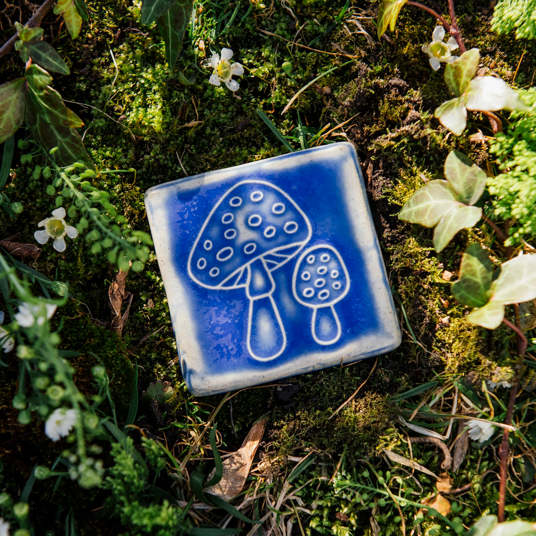 This tile features the matte bright steel blue-ish purple Periwinkle Glaze.