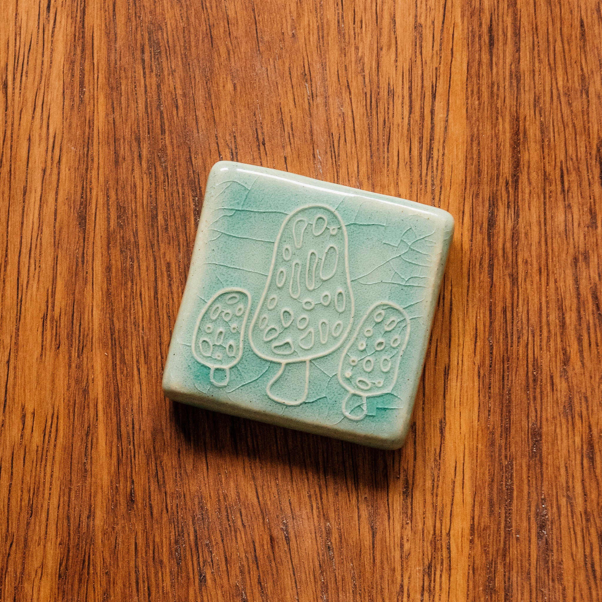 This tile features the glossy pale blue Celadon glaze.