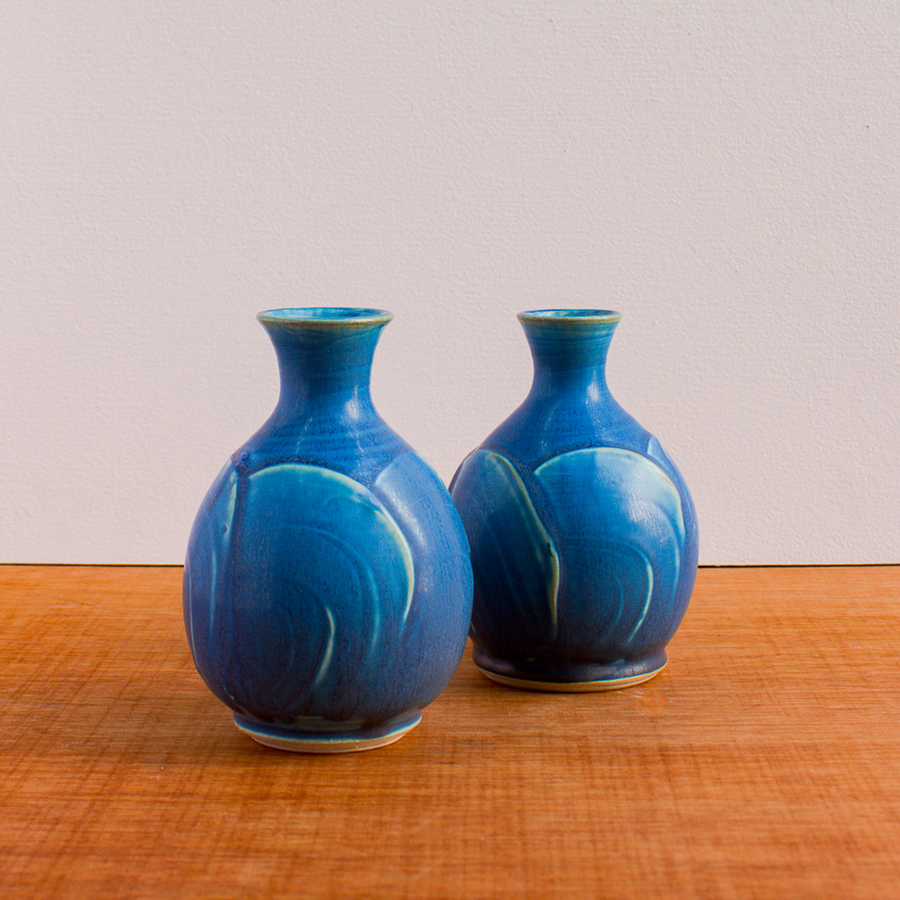 This Bud vase features the matte French blue Peacock glaze.