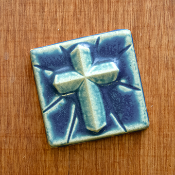 This Mario's Cross Tile features the matte french blue Peacock glaze.