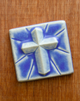 This Mario's Cross Tile features the matte bright steel blue Periwinkle Glaze.