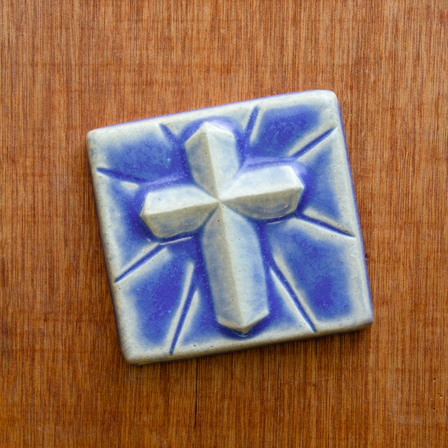 This Mario's Cross Tile features the matte bright steel blue Periwinkle Glaze.