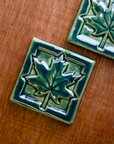 This Maple Leaf Tile features the glossy deep green Kale glaze.