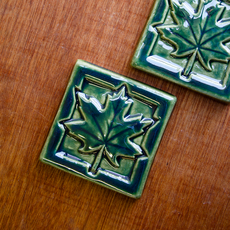 This Maple Leaf Tile features the glossy deep green Kale glaze.