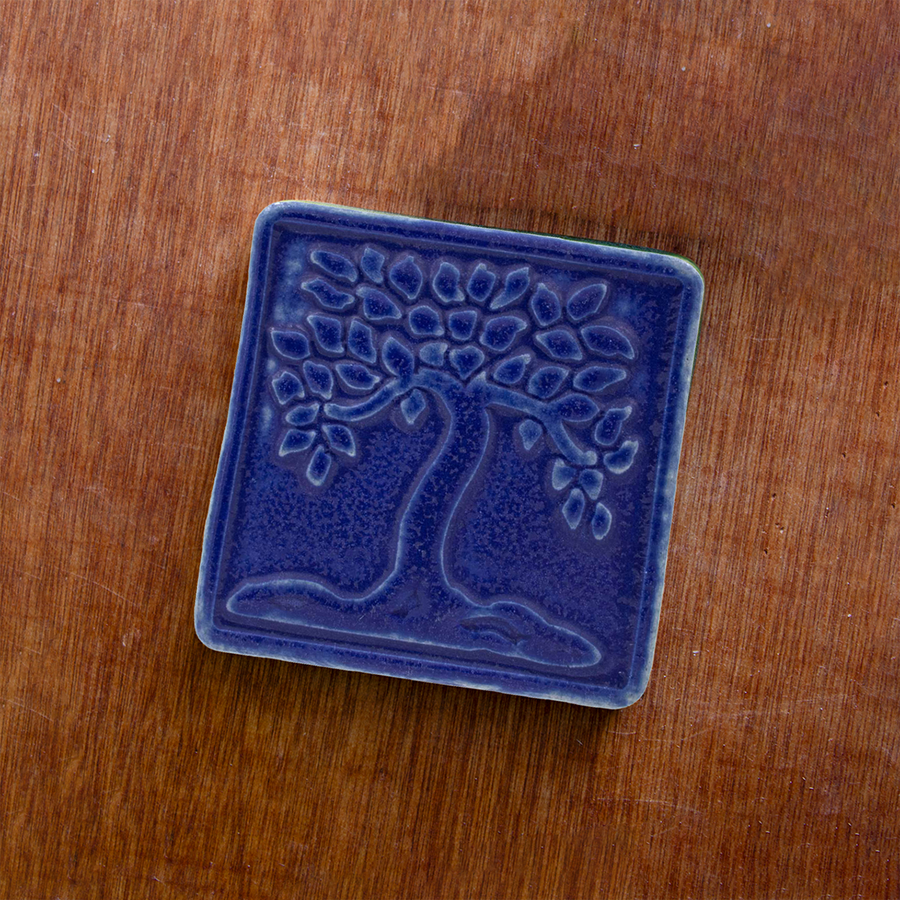 This ceramic Botanical Tree tile features the matte deep blue Cobalt glaze.