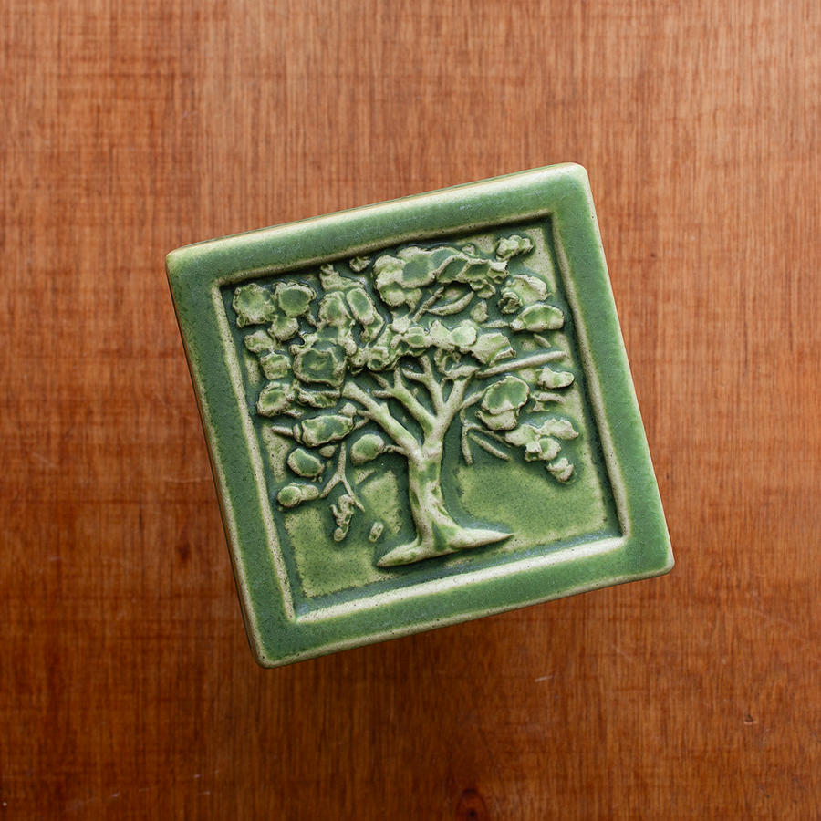 This tile features the matte organic green Leaf glaze.