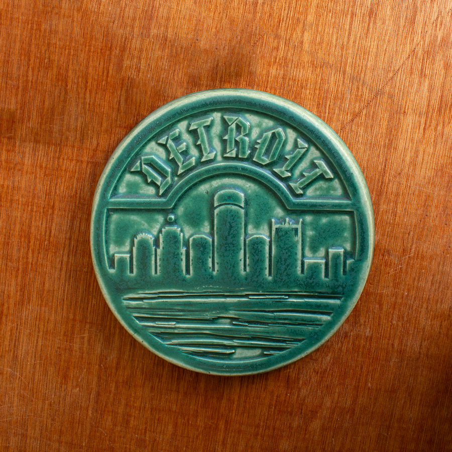 This Detroit Trivet Tile features the matte blueish-green Pewabic Green glaze.