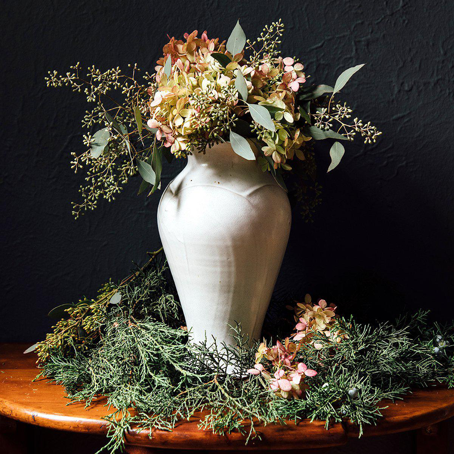 This Classic Vase features the creamy white Birch glaze that has some brown speckling.