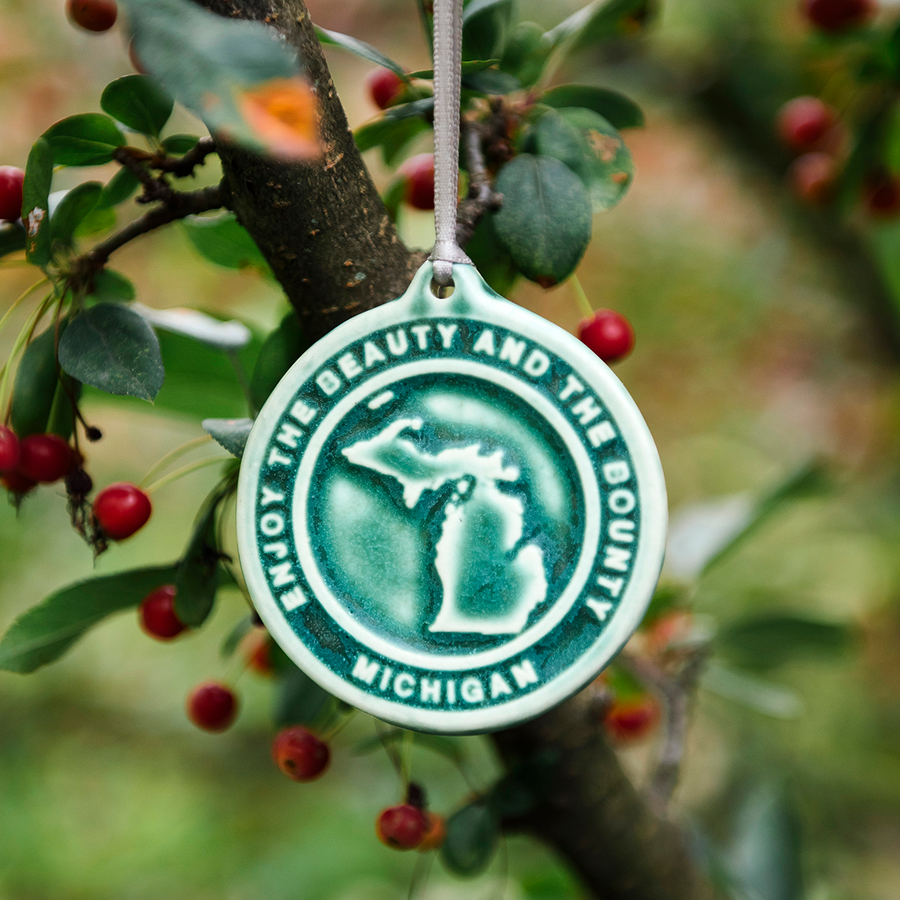 This Michigan Ornament features the matte blueish-green Pewabic Green glaze.