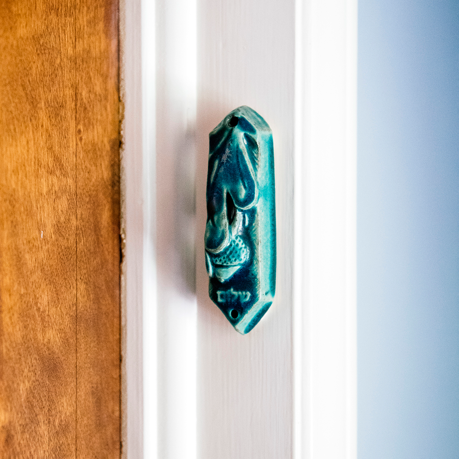 This Mezuzah features the matte turquoise Pewabic Blue glaze.