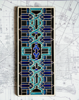 This Guardian Pattern Tile features glaze Style A which includes multiple shades of glossy blue with black accents.