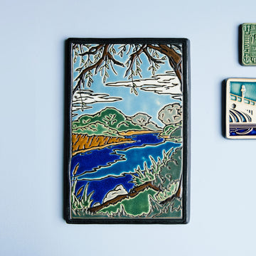 The Hand-Painted Lake Okonoka Tile.