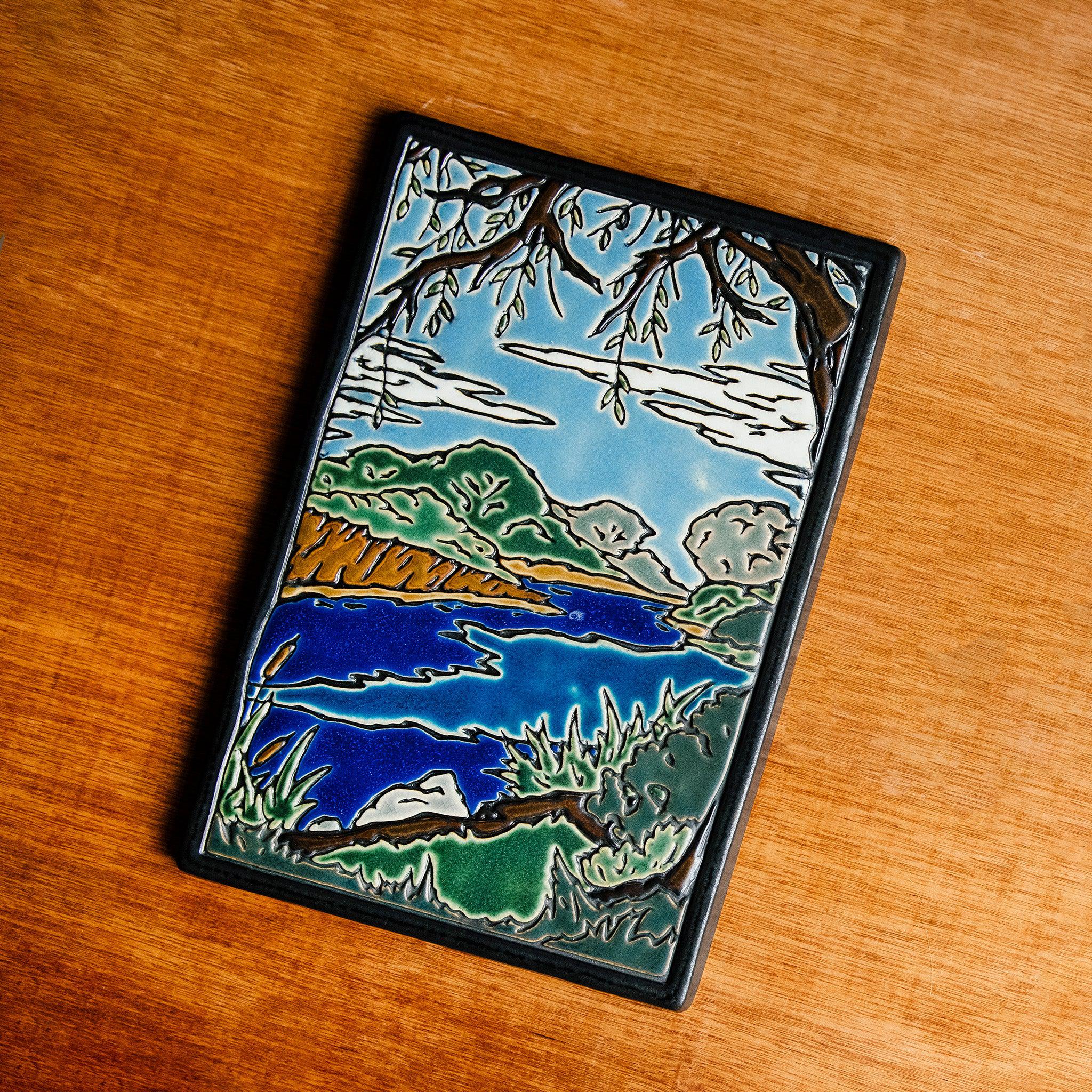 The Hand-Painted Lake Okonoka Tile.