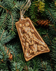 This ornament comes in a matte brown glaze with a pale golden ribbon.