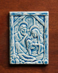 This Nativity Tile features the glossy steel blue Celestite Glaze.