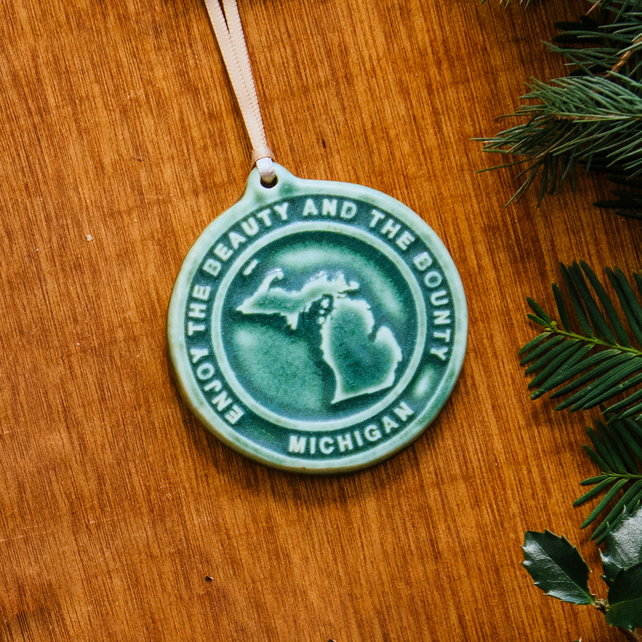 This Michigan Ornament features the matte blueish-green Pewabic Green glaze.