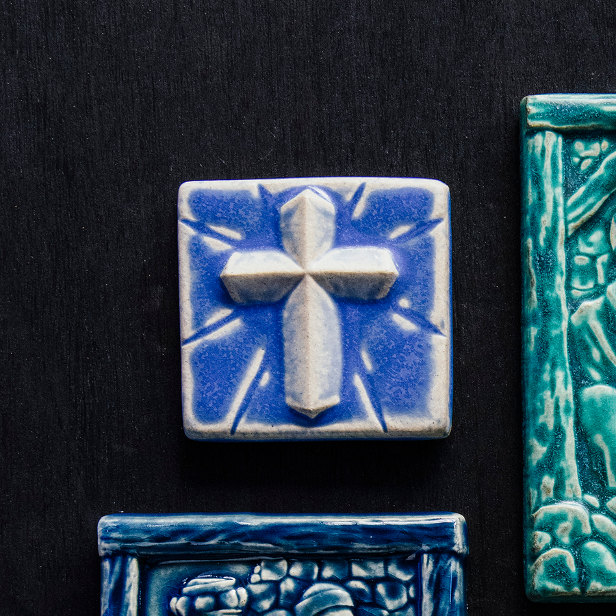 This Mario's Cross Tile features the matte bright steel blue Periwinkle Glaze.