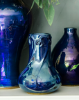 Azurite Iridescent pieces often have flashes that range from silver to purple and green that accentuate this bold blue glaze.