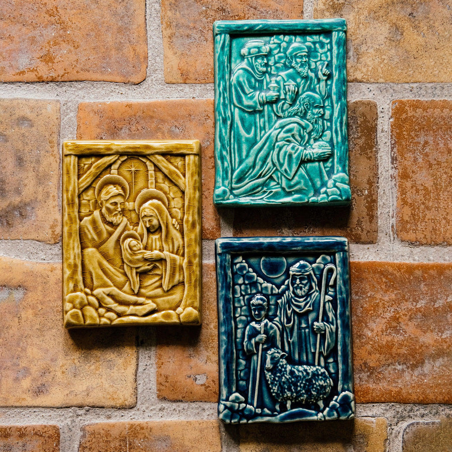 The Nativity Tile is displayed on a brick background with the other two tiles in the triptich - the Three Wisemen and the Shepherds tiles.