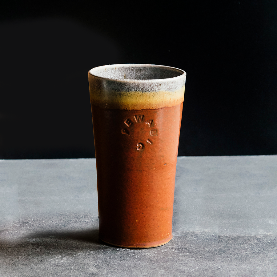 This Pint features the matte brownish-red tones of the Cinnamon glaze with a gray interior and lip.