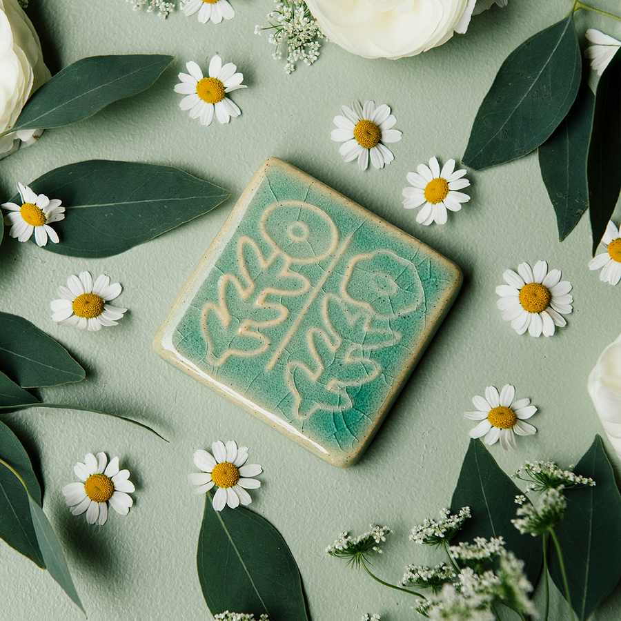 This tile features the glossy pale blue Celadon glaze.