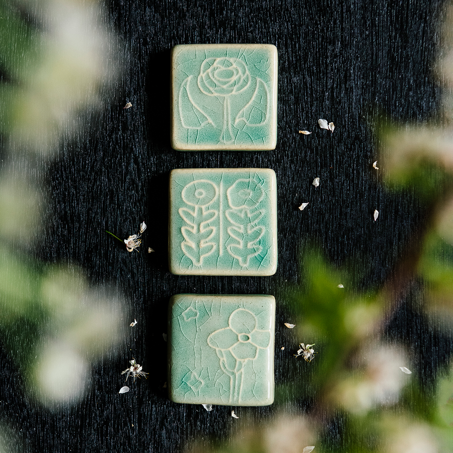 The Two Flowers Tile is displayed with the other two tiles in this series - the Rose Tile and the Cactus Flower Tile.