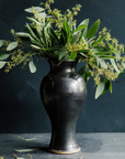 This Classic Vase features the satin-finished steel black Gun Metal Glaze that has some green accents.