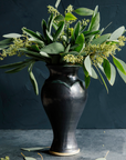 This Classic Vase features the satin-finished steel black Gun Metal Glaze that has some green accents.
