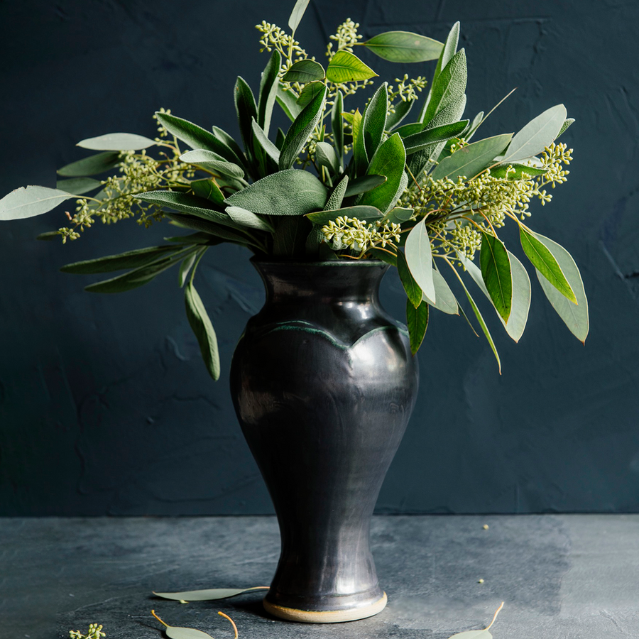 This Classic Vase features the satin-finished steel black Gun Metal Glaze that has some green accents.