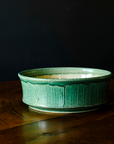 This Mod Bowl features the matte blueish-green Pewabic Green glaze.