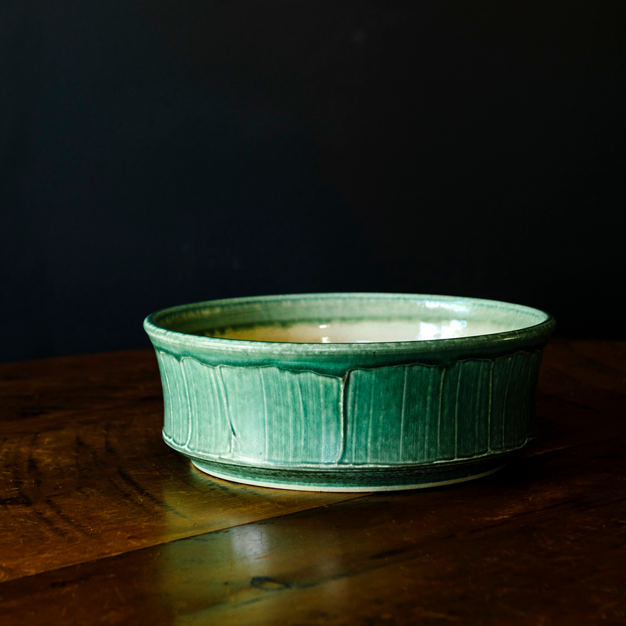 This Mod Bowl features the matte blueish-green Pewabic Green glaze.