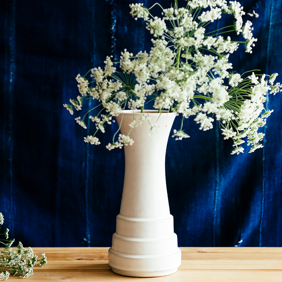 This vase features the creamy white Birch glaze that contains some sparse brown speckling.