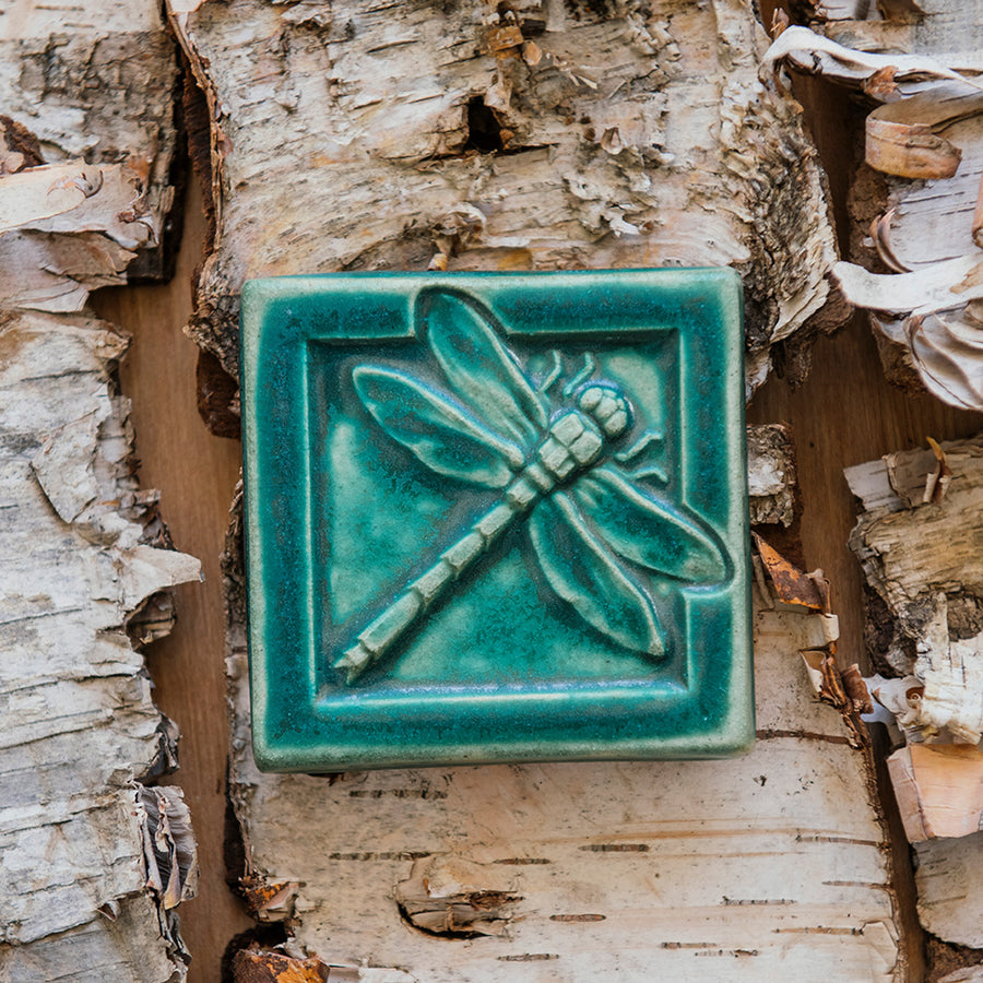 This Dragonfly Tile features the matte blueish-green Pewabic Green glaze.