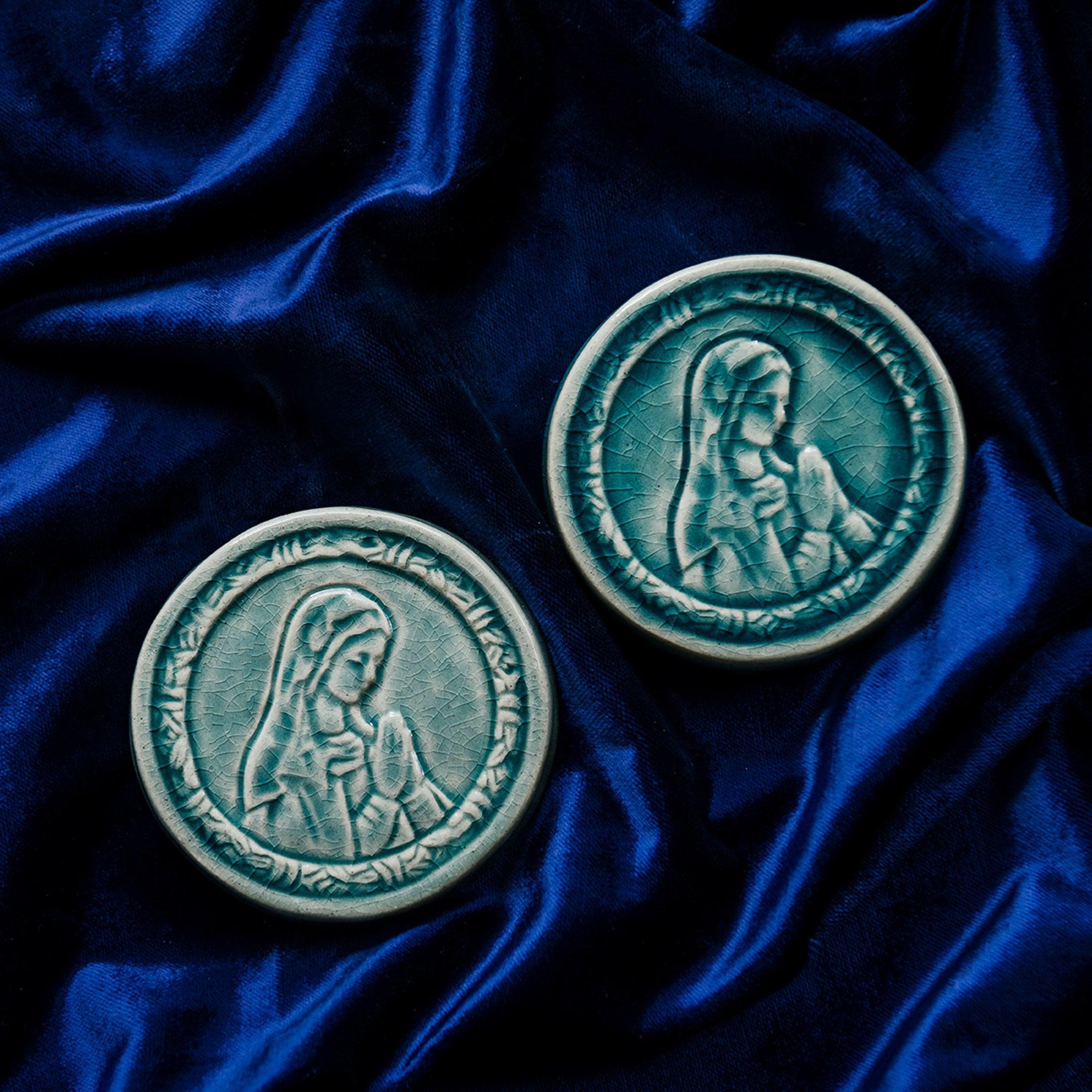 These ceramic Blessed Virgin Mary Tiles are glazed in a pale blue, glossy Glacier glaze. 