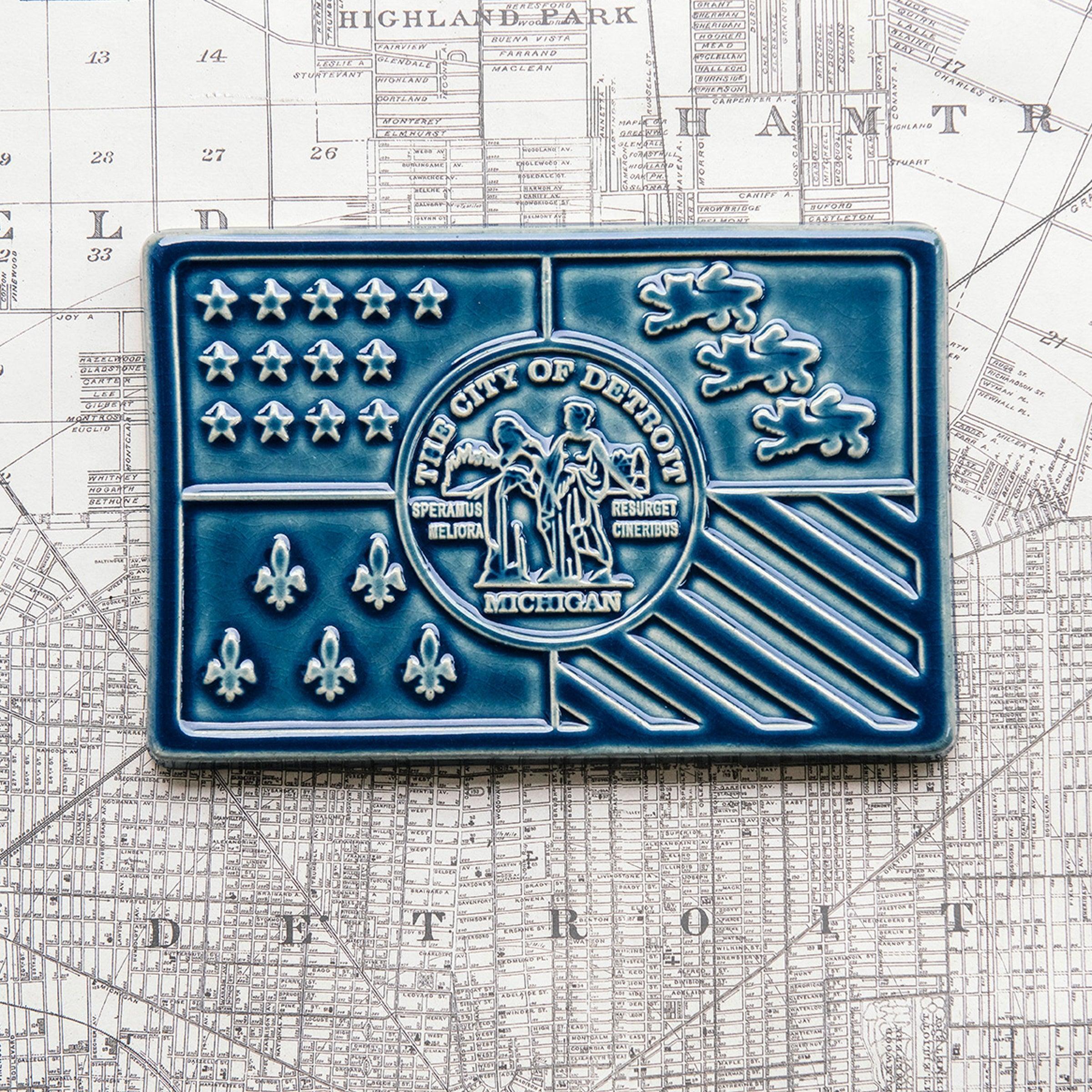 This Detroit Flag tile features the glossy deep blue Ocean glaze.