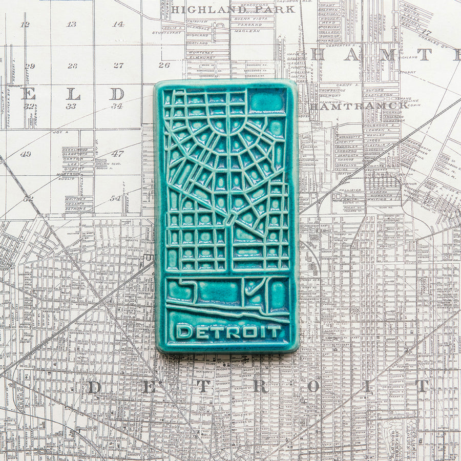 This tile features the matte turquoise Pewabic Blue glaze.