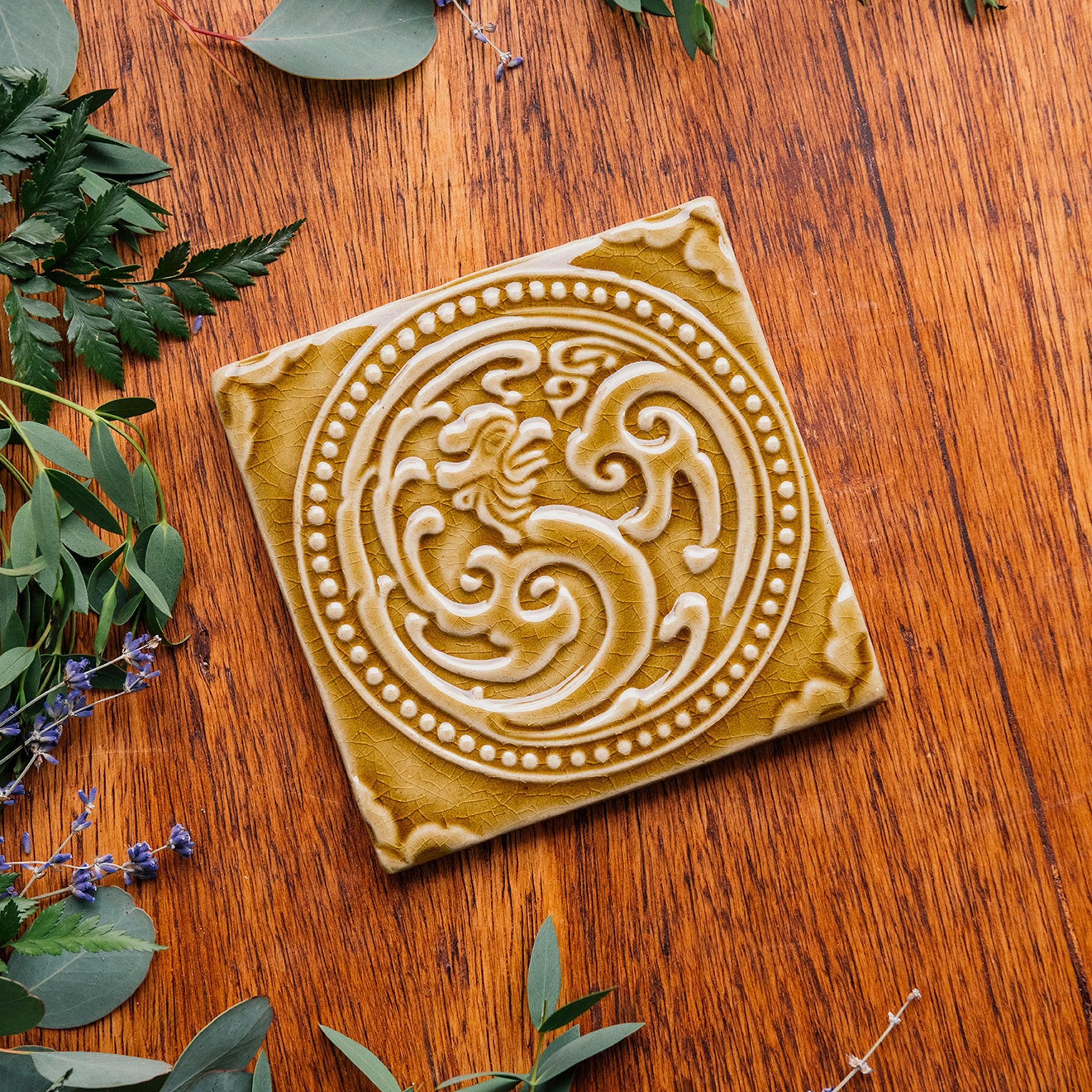 This Phoenix Tile features the glossy deep golden Honey glaze.