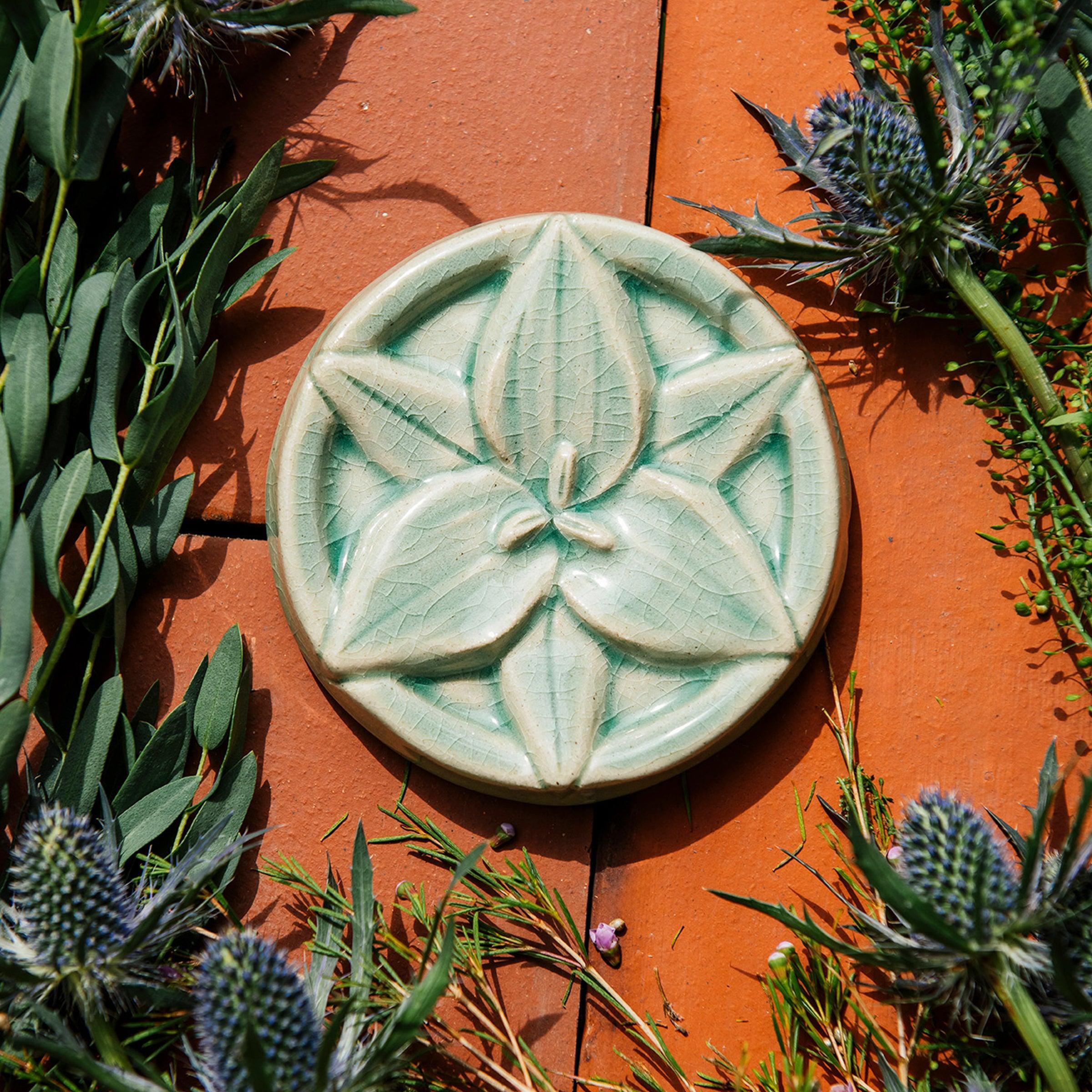 This tile features the glossy pale blue Celadon glaze.