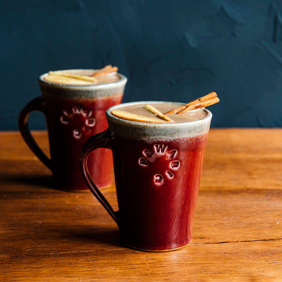 These mugs feature the glossy, deep red Winterberry glaze.