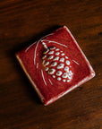 3x3 Pinecone Tile | Winterberry